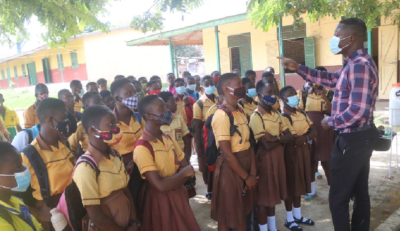 Learners celebrating their return to school